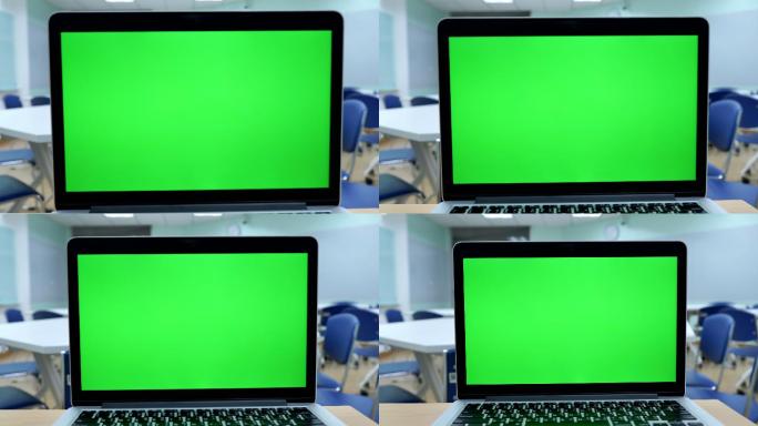 教室里摆放着绿屏笔记本电脑