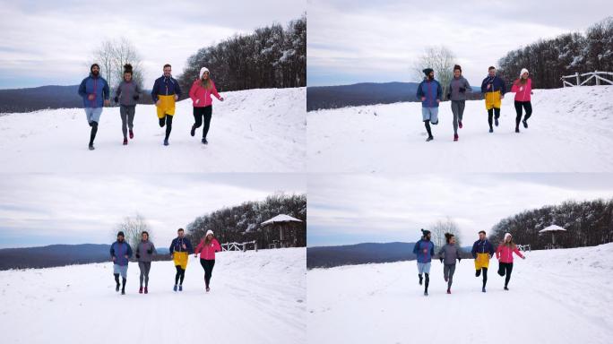 一群年轻运动员在寒冷的冬日在户外慢跑。