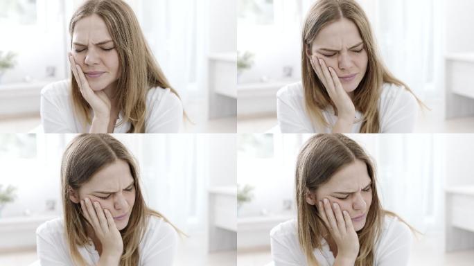 牙痛的女人牙龈蛀牙刷牙