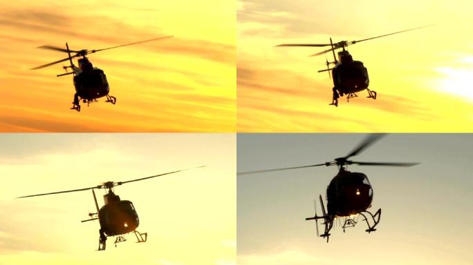 日落时飞行的直升飞机