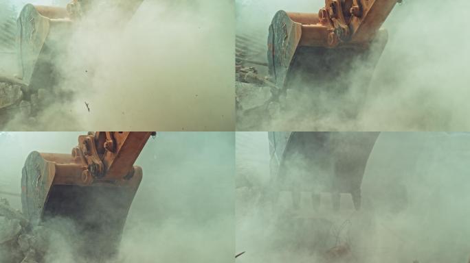 挖土机拆除一栋旧建筑时，一团尘土飘向空中