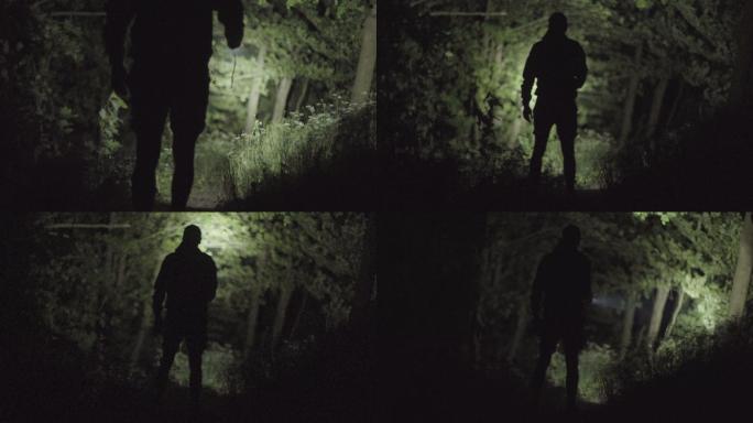 夜晚孤独地漫步在森林里