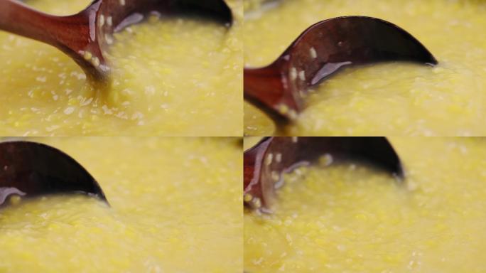 【正版素材】玉米碴粥特写搅拌固定