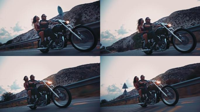 摩托车手和女朋友在高速公路上骑摩托车