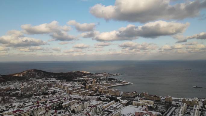 4k无人机航拍雪后海岸线雪景