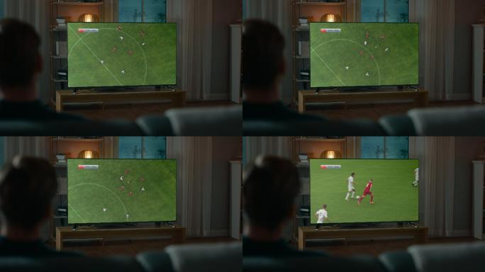 男人晚上在家看足球赛