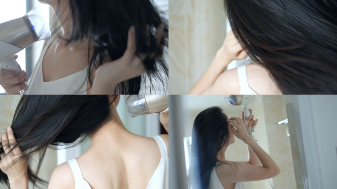 早晨女孩在浴室吹头发背影视频素材
