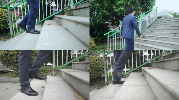 穿着西装的男人走楼梯