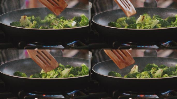 在平底锅里炒西兰花做一道菜