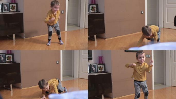 小男孩跳舞和模仿拳击动作