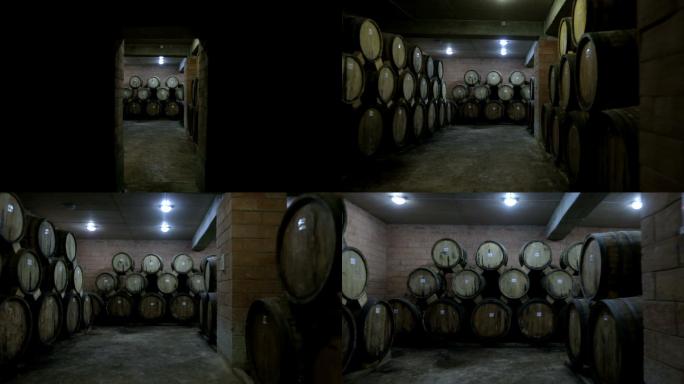 葡萄酒酿造厂与长排酒桶。