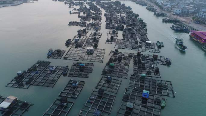 海南万宁港北码头航拍夕阳疍家人