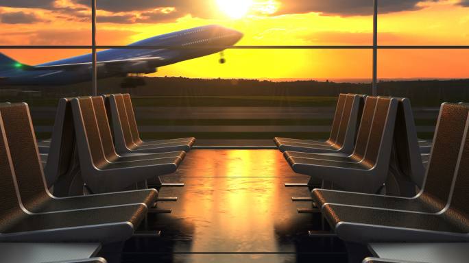 从候机室的窗户可以看到飞机在夕阳下起飞