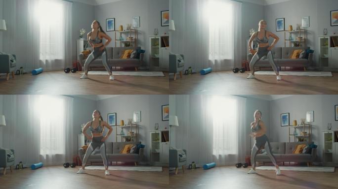 运动健身女孩在客厅里做有氧运动