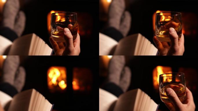 一个人看书，喝着一杯威士忌
