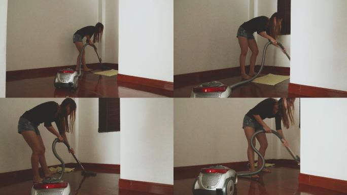 女性使用吸尘器清洗地面