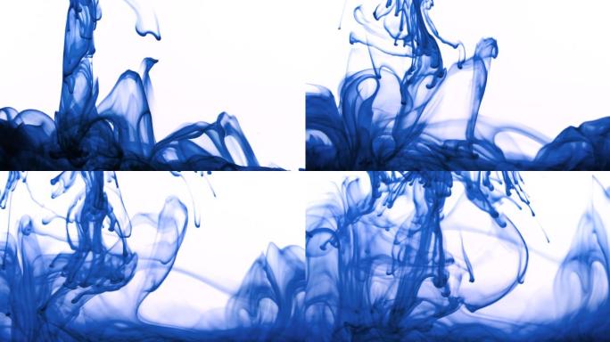 蓝色喷墨在水中膨胀并缓慢旋转。