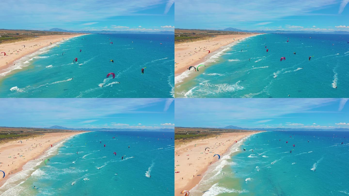 海滩上挤满了风筝冲浪者