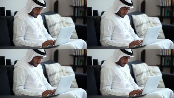 中东男子使用笔记本电脑