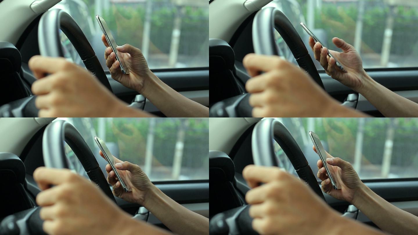 男人在车里用智能手机