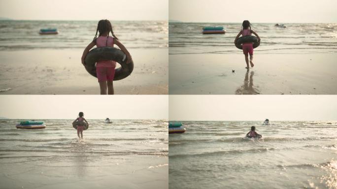 一个拿着游泳圈向大海跑去的女孩