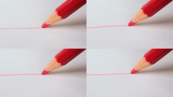 用红铅笔在白纸上画红线