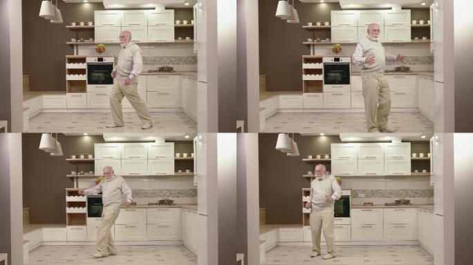 快乐的老人在厨房跳舞