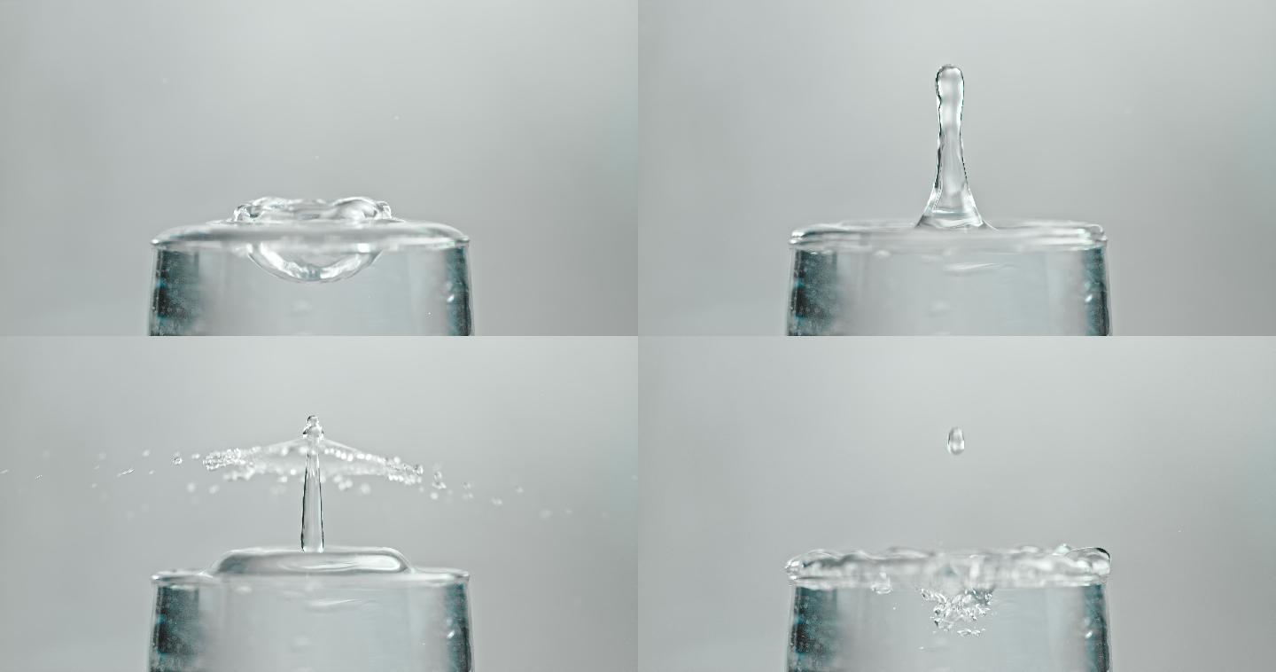 水溅到玻璃杯里升格慢动作矿泉水元素高速摄