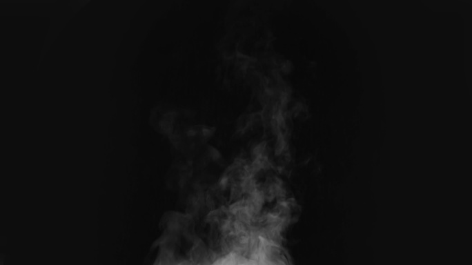 白蒸汽从黑色背景里冒出来。