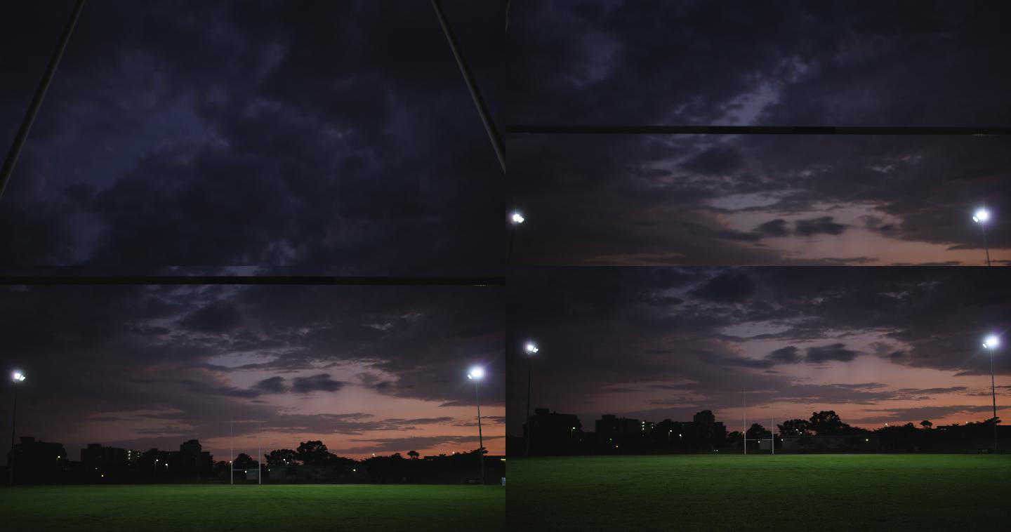 夜间橄榄球场球场灯光照明设施黄昏夜幕降临