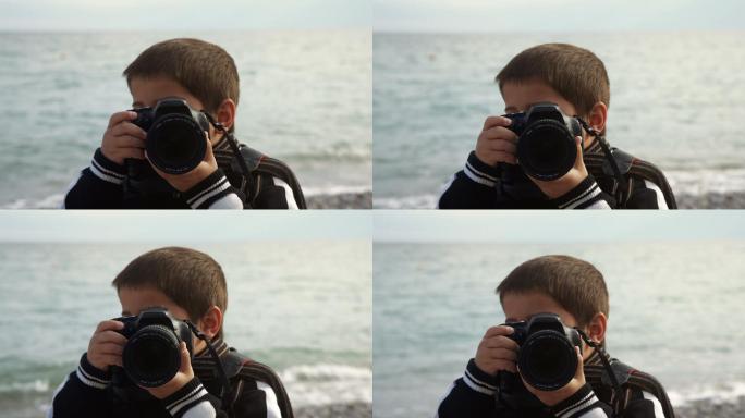 一个拿着照相机的男孩在拍照