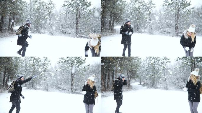 在雪地玩雪球环境玩耍女朋友
