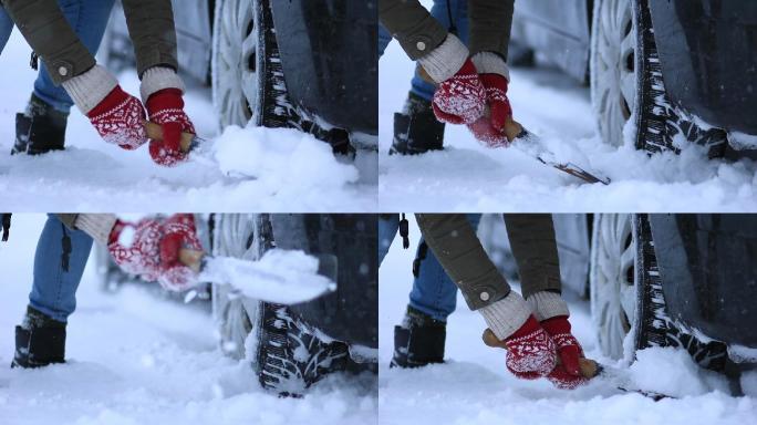 从车上铲雪的女人的特写镜头