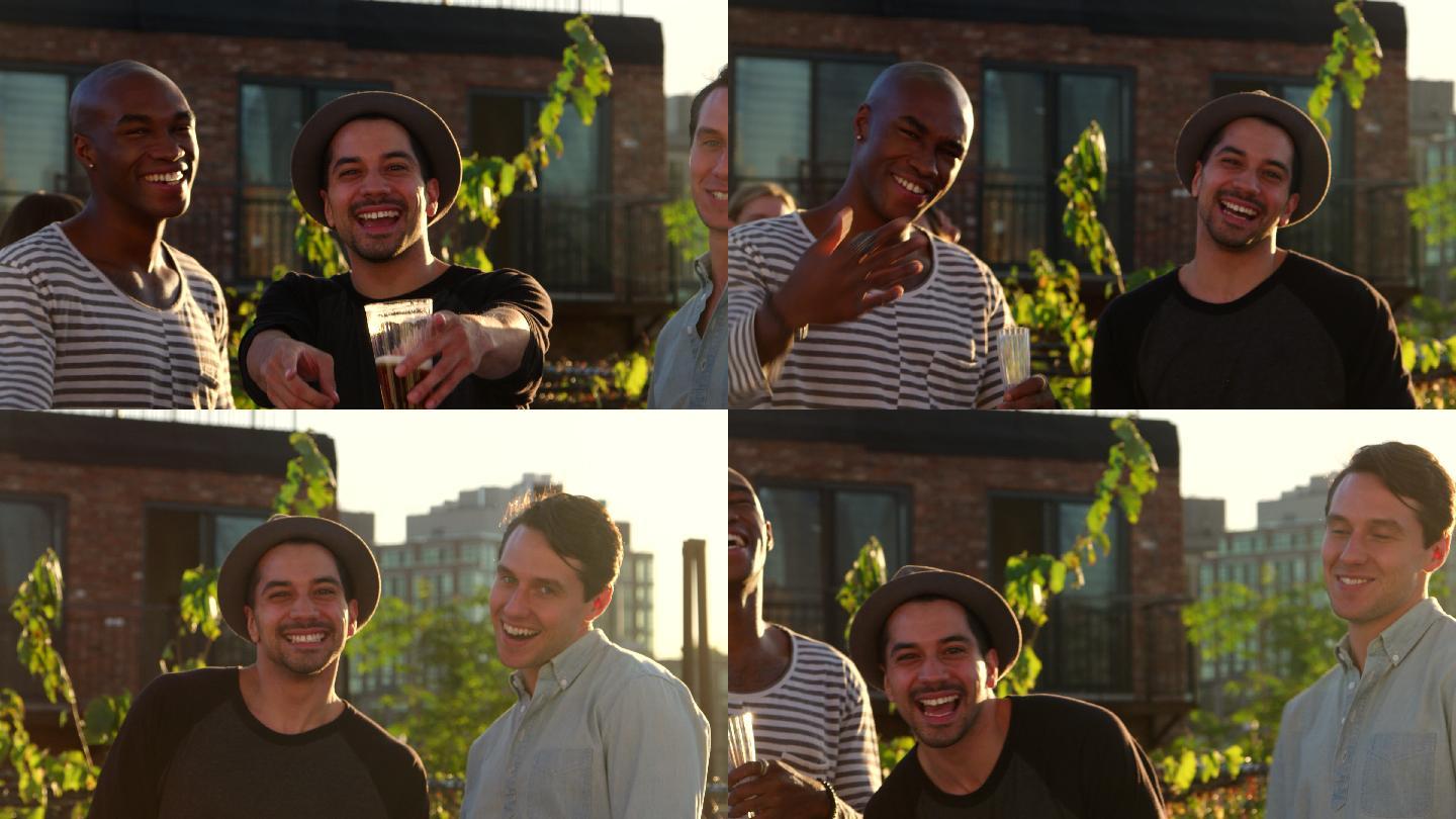 三个男性朋友在屋顶派对上对着镜头大笑