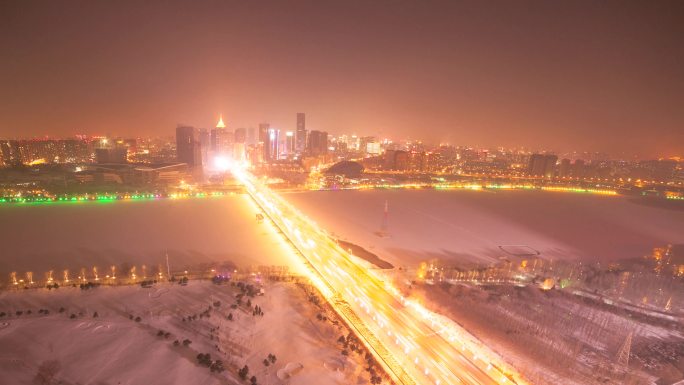 沈阳城市延时雪景日转夜
