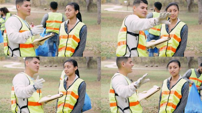 社区清洁志愿者协调员对女志愿者进行指导