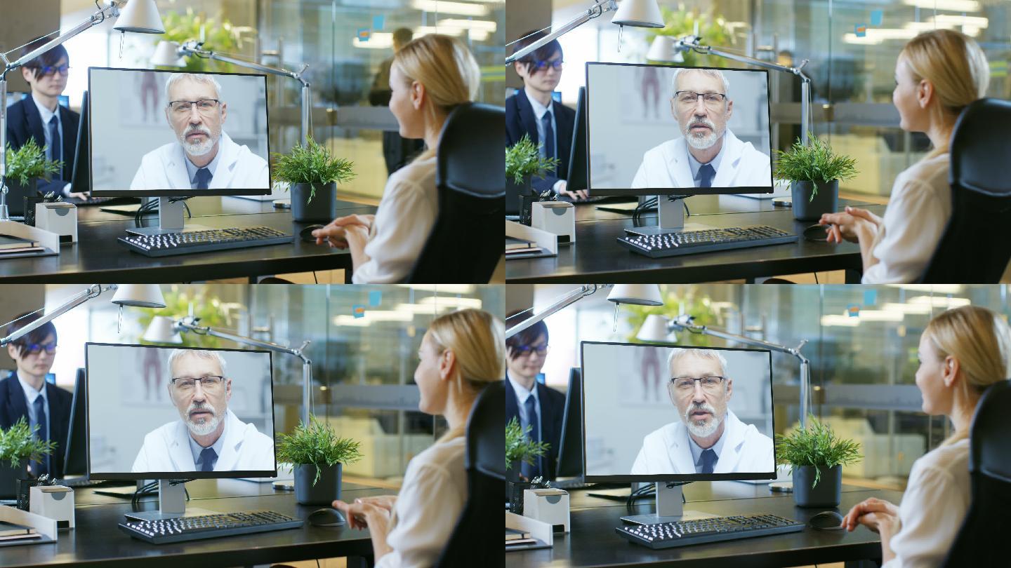 在办公室里，女人通过电脑与医生通话