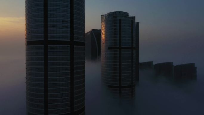 海边城市平流雾航拍日出