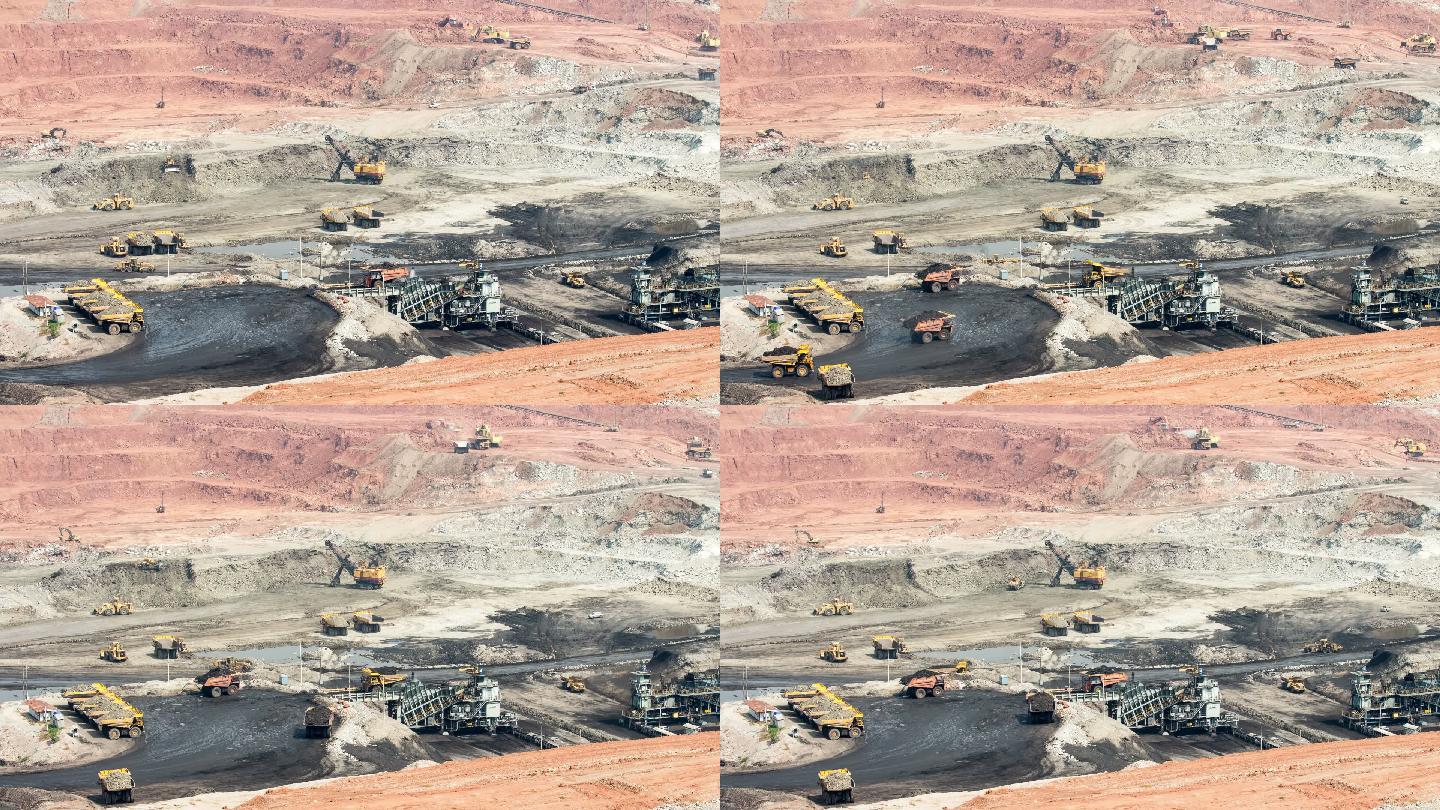 一个矿坑的一部分，大型矿车正在工作