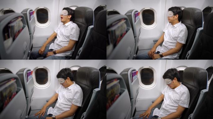 在飞机上戴着眼罩睡觉的人