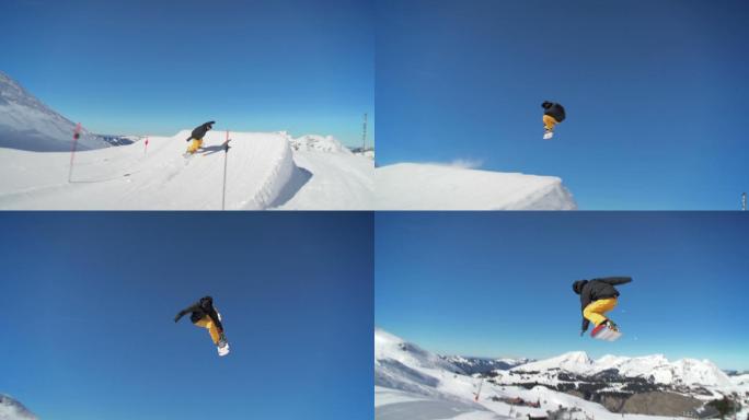 滑雪板运动员在滑雪场跳跃