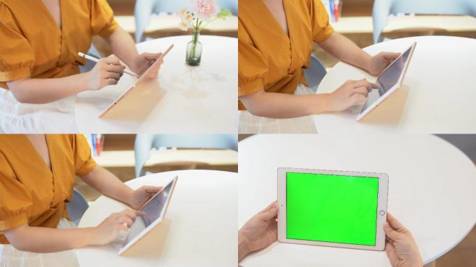 办公室白领设计师使用pad绘画看网页绿幕