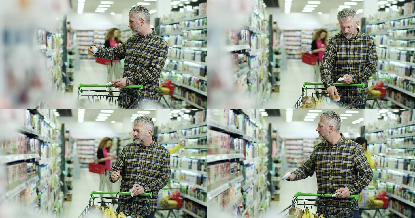 在超市检查购物清单的人