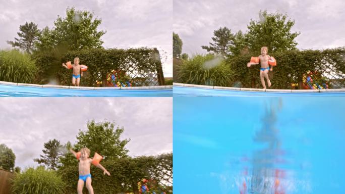 一个男孩跳入游泳池