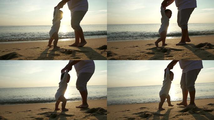 母亲帮助婴儿学习走路在沙滩上。