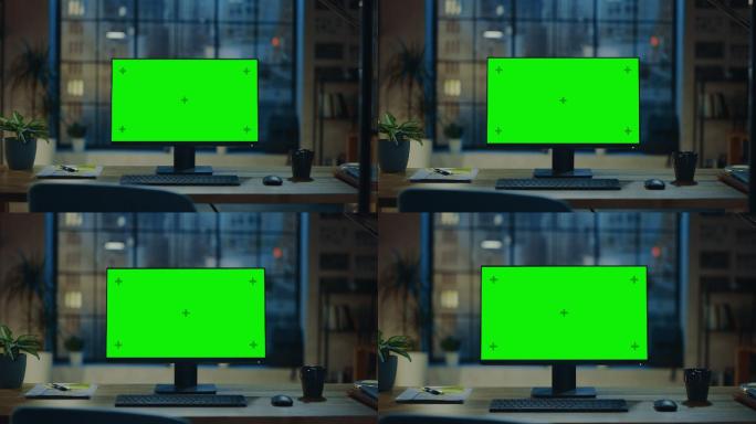 一台绿色屏幕的台式电脑。