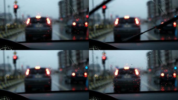 雨中交通堵塞汽车挡风玻璃上的雨刷器摇摆
