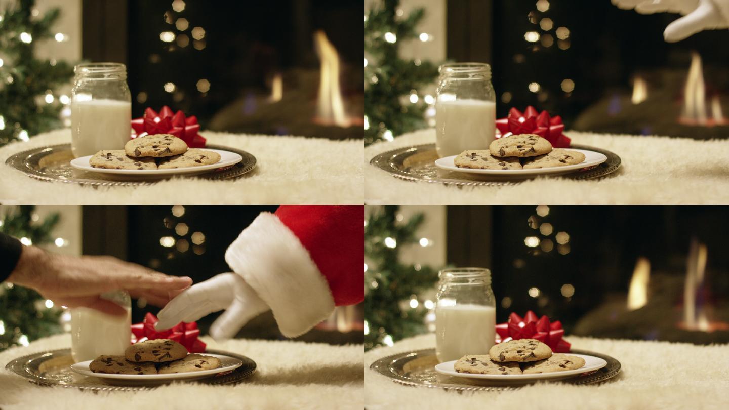 圣诞老人试图从盘子里拿起一块巧克力饼干