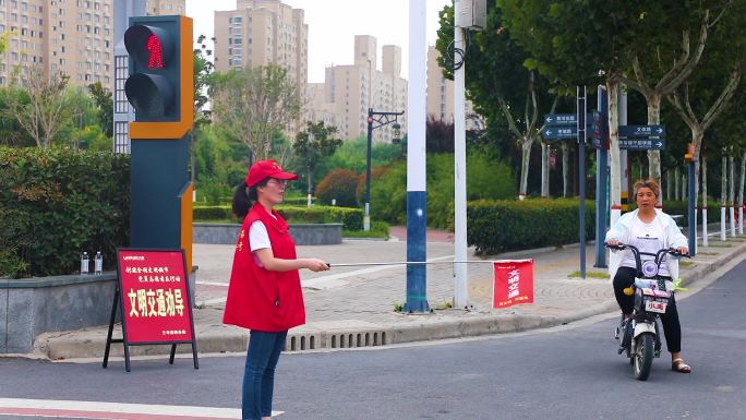 志愿者：交通劝导，文明出行