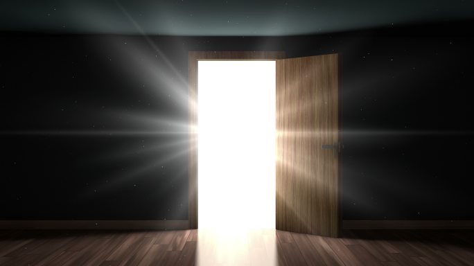 房间里的光和粒子穿过敞开的门